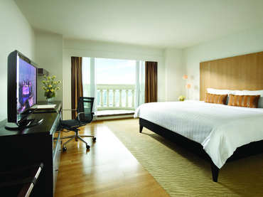 King size bed balcony and desk with chair